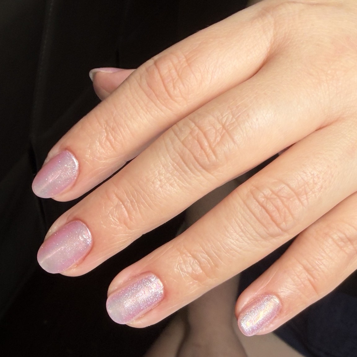 Soft pink pearlescent nails